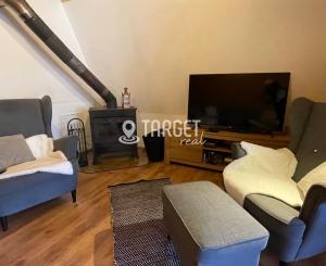 TARGETreal | NA PREDAJ REKREAČNÁ CHATA S 5 STAVEBNÝMI POZEMKAMI, VALČA